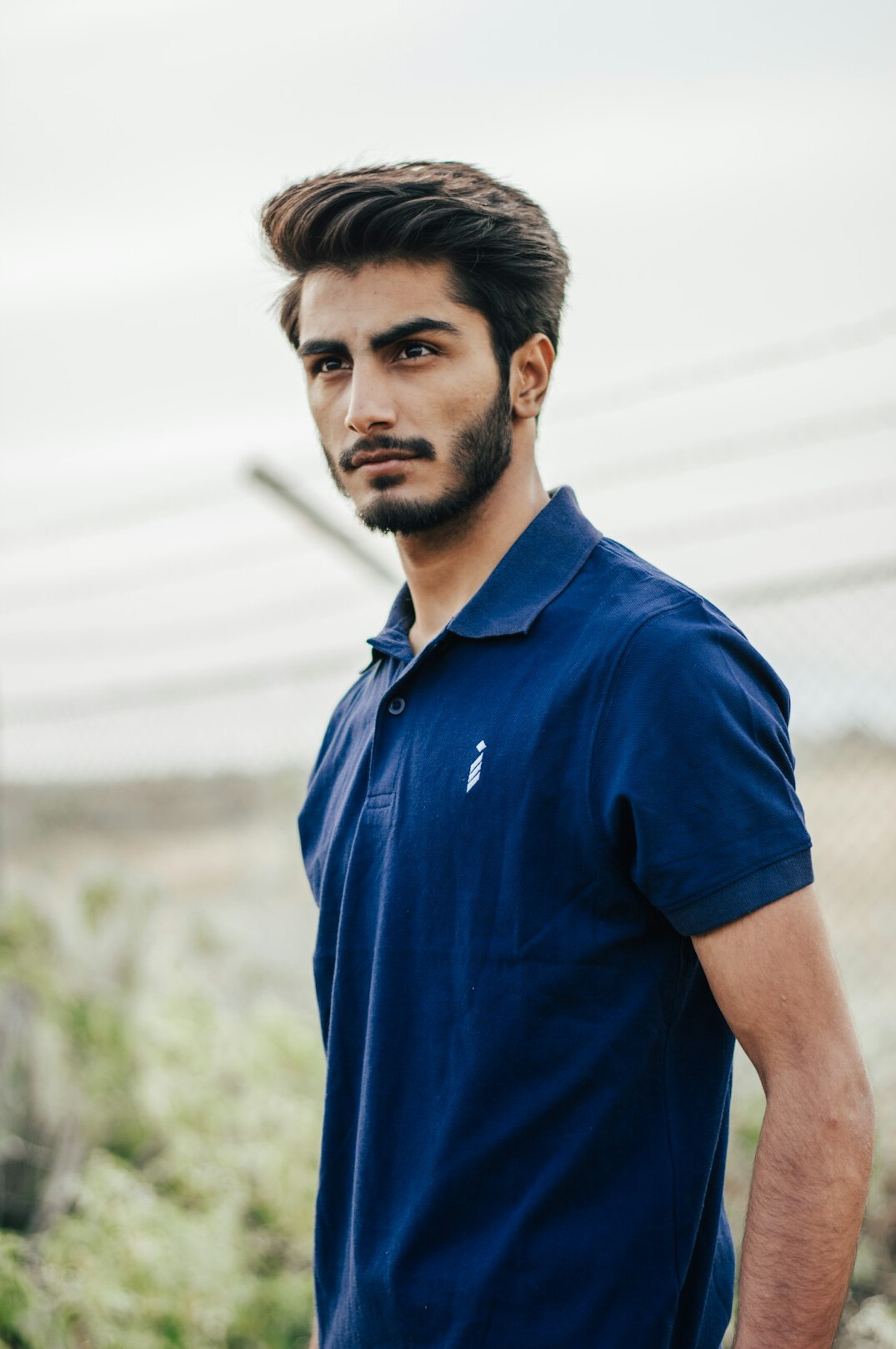 Portrait of a man with a beard looking at the camera