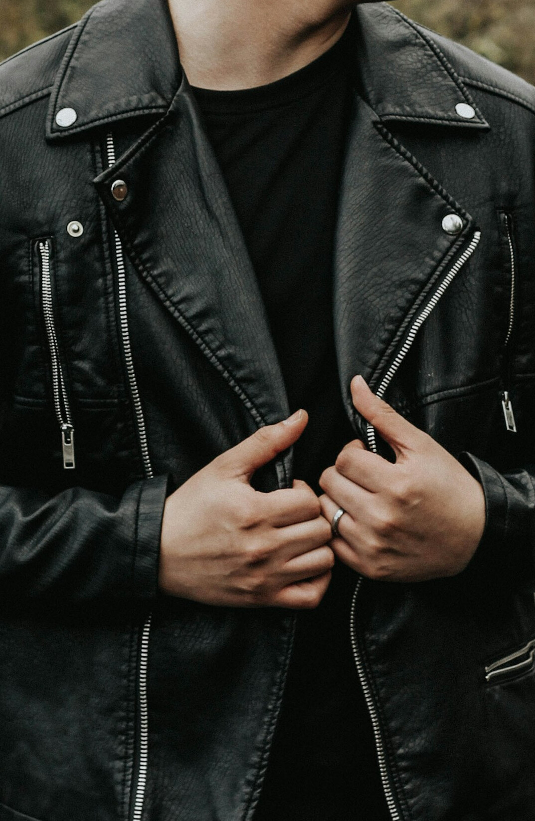 man hiding product in jacket