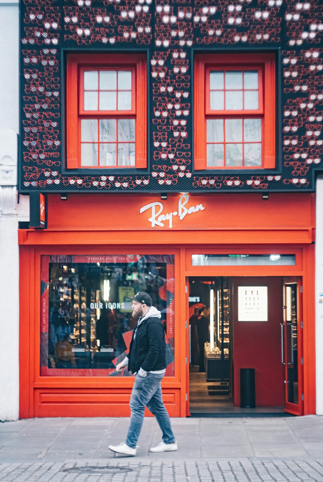 man running from store