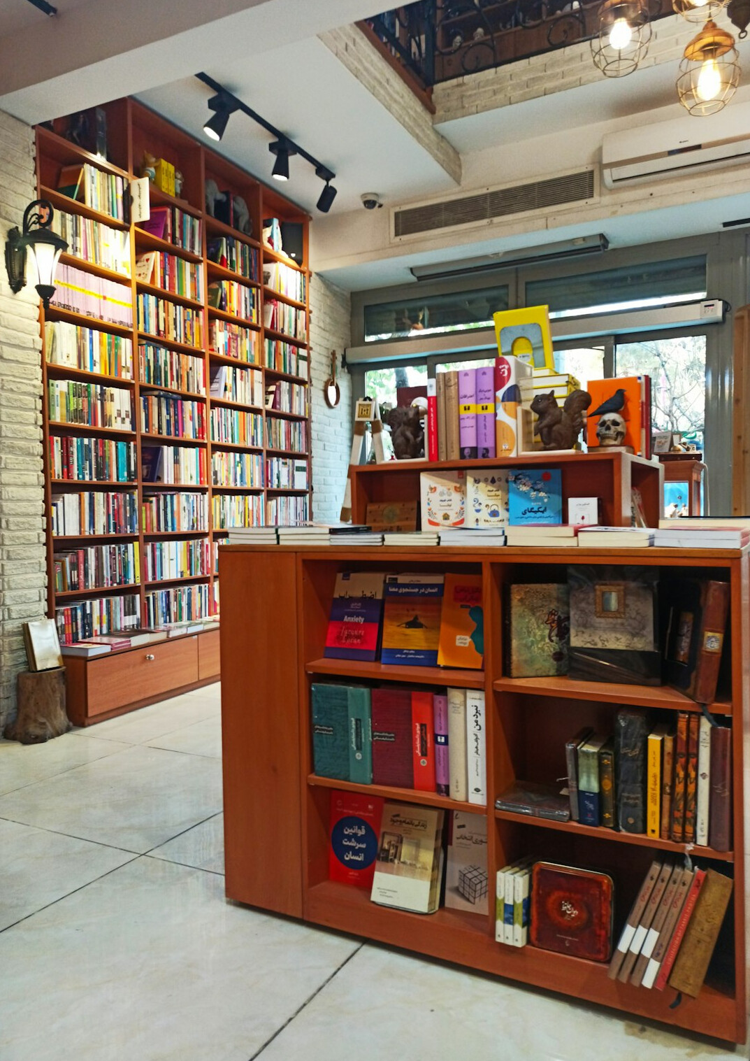 Long library aisle with shelves full of books